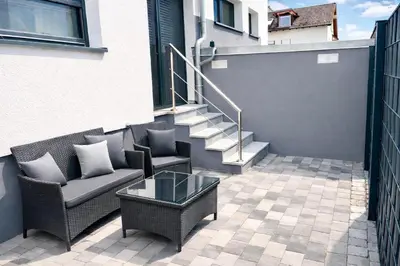Ein Balkon oder eine Terrasse in der Unterkunft STN Business Suite - Ferienwohnung mit Parkplatz & Balkon, Terrasse & Fußbodenheizung, Netflix Premium, Zentral zu Audi & Schwarz Gruppe
