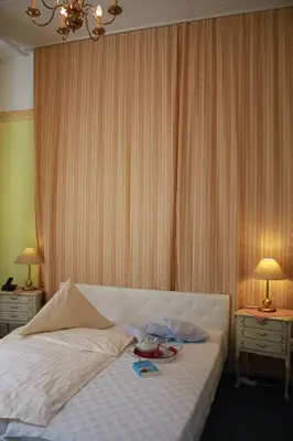 Ein Bett oder Betten in einem Zimmer der Unterkunft Hotel Waldfriede