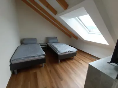 Ein Bett oder Betten in einem Zimmer der Unterkunft Weinrebenblick