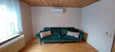 Ein Sitzbereich in der Unterkunft Apartment Popp Langen