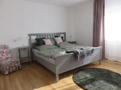 Ein Bett oder Betten in einem Zimmer der Unterkunft Ferienwohnung Auszeit