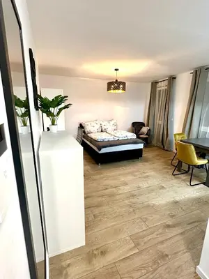 Ein Bett oder Betten in einem Zimmer der Unterkunft Moderne 1-Zi Stadtwohnung