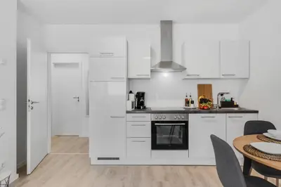 Küche/Küchenzeile in der Unterkunft WINETIME - modern - Boxspringbetten - Nähe Mercedes-Benz