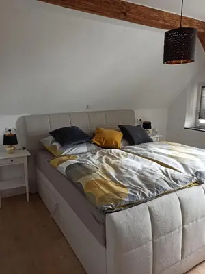 Ein Bett oder Betten in einem Zimmer der Unterkunft Ferienhaus Dinger