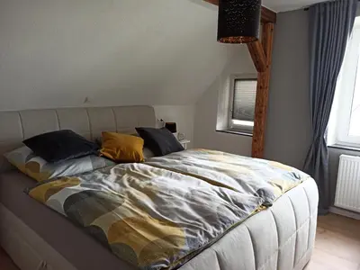 Ein Bett oder Betten in einem Zimmer der Unterkunft Ferienhaus Dinger