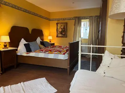 Ein Bett oder Betten in einem Zimmer der Unterkunft Schönbachhof