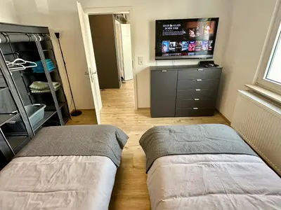Ein Bett oder Betten in einem Zimmer der Unterkunft Rhein Quartier - Biebesheim