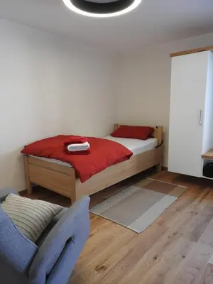 Ein Bett oder Betten in einem Zimmer der Unterkunft Einzel- Monteurzimmer barrierfrei