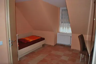 Ein Bett oder Betten in einem Zimmer der Unterkunft Hotel Gasthof “Goldener Engel”