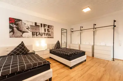 Ein Bett oder Betten in einem Zimmer der Unterkunft NECKARWESTHEIMER Appartement