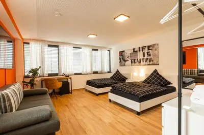 Ein Sitzbereich in der Unterkunft NECKARWESTHEIMER Appartement