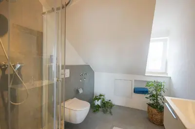 Ein Badezimmer in der Unterkunft Modernes und helles Apartment im Loft Stil