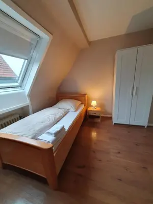 Ein Bett oder Betten in einem Zimmer der Unterkunft Privatzimmer im Schlesischen Viertel - nahe Uniklinik