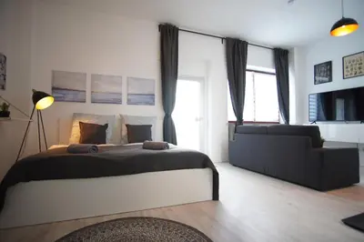 Ein Bett oder Betten in einem Zimmer der Unterkunft LENASTAY I NostalgieApartment I Innenstadt
