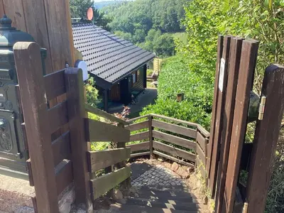 Ein Garten an der Unterkunft Chalet Spessart