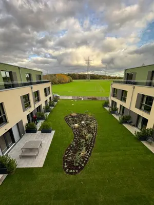 Ein Garten an der Unterkunft Fair n Square Hotel 24 Stunden Self-Check In