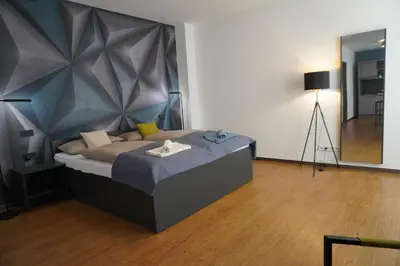 Ein Bett oder Betten in einem Zimmer der Unterkunft Fair n Square Hotel 24 Stunden Self-Check In