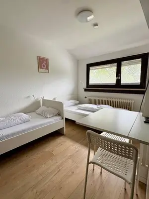 Ein Bett oder Betten in einem Zimmer der Unterkunft kleine und charmante Monteurs Unterkunft D