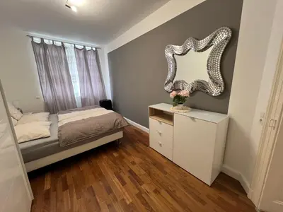Ein Bett oder Betten in einem Zimmer der Unterkunft Schöne 3 Zimmer Wohnung in Top Lage Heidelberg