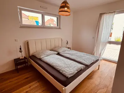 Ein Bett oder Betten in einem Zimmer der Unterkunft Romantisches wohnen