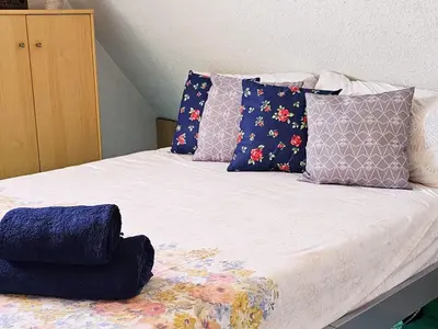 Ein Bett oder Betten in einem Zimmer der Unterkunft Wohnung mit Privtbad