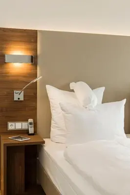 Ein Bett oder Betten in einem Zimmer der Unterkunft Living Apartments Ludwigshafen