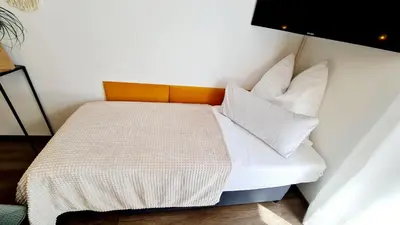 Ein Bett oder Betten in einem Zimmer der Unterkunft Ferienwohnungen Krüger ''Apartment Finn