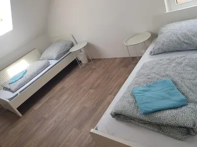 Ein Bett oder Betten in einem Zimmer der Unterkunft Monteurwohnung Heilbronn Zentrum