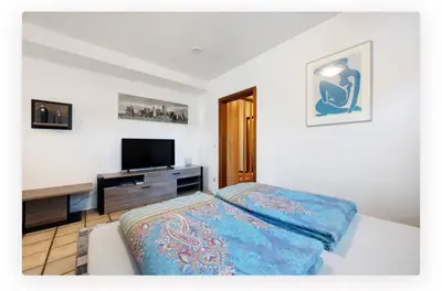 Ein Bett oder Betten in einem Zimmer der Unterkunft ruhige Wohnung im Schwarzwald (Pforzheim, OT Würm)