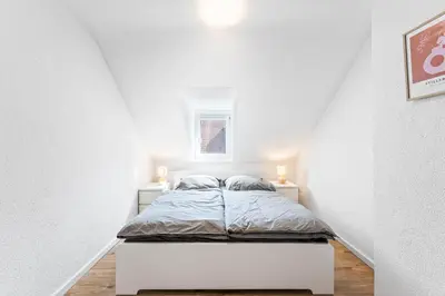 Ein Bett oder Betten in einem Zimmer der Unterkunft Casa Bergstraße 3