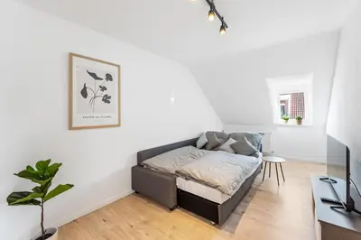 Ein Bett oder Betten in einem Zimmer der Unterkunft Casa Bergstraße 3