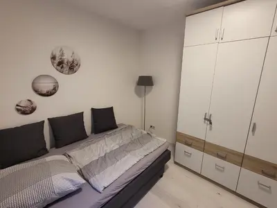 Ein Bett oder Betten in einem Zimmer der Unterkunft Souterrainwohnung