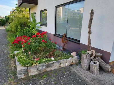 Ein Garten an der Unterkunft Moderne 2 Zimmerwohnung/ Eggenstein/nähe KIT Nord