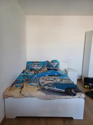 Ein Bett oder Betten in einem Zimmer der Unterkunft Wohnung Waldstadt-Zentrum