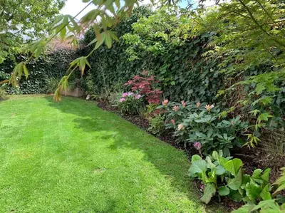 Ein Garten an der Unterkunft Exklusive Wohnung mit herrlicher Terrasse und Garten