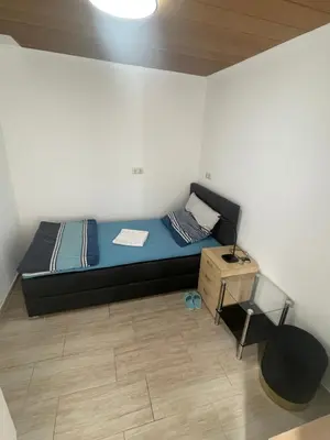 Ein Bett oder Betten in einem Zimmer der Unterkunft Kleine aber feies Zimmer