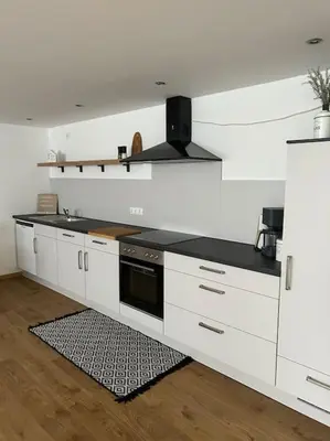 Küche/Küchenzeile in der Unterkunft „Main“ Zuhause