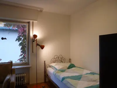 Ein Bett oder Betten in einem Zimmer der Unterkunft Im Efeu