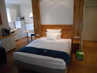 Ein Bett oder Betten in einem Zimmer der Unterkunft Warum ins Hotel