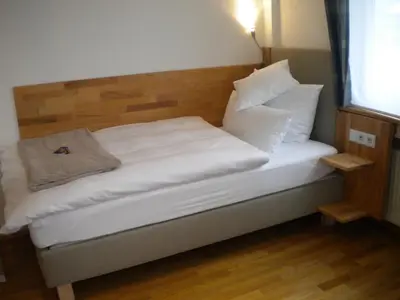 Ein Bett oder Betten in einem Zimmer der Unterkunft Warum ins Hotel