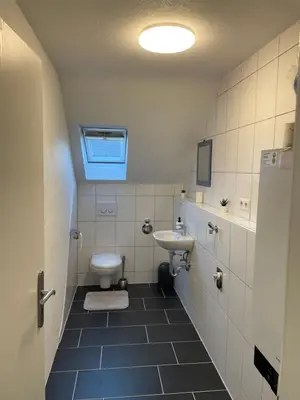 Ein Badezimmer in der Unterkunft Apartment Delux mit 4 Schlafzimmer