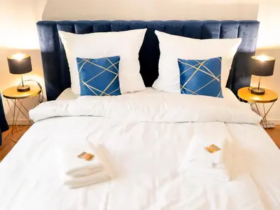 Ein Bett oder Betten in einem Zimmer der Unterkunft Premium Studio - 1 Min to HBF