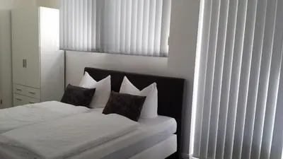 Ein Bett oder Betten in einem Zimmer der Unterkunft HD City Apartments