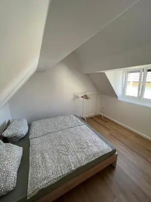 Ein Bett oder Betten in einem Zimmer der Unterkunft Modernes Haus 5 Min vom See