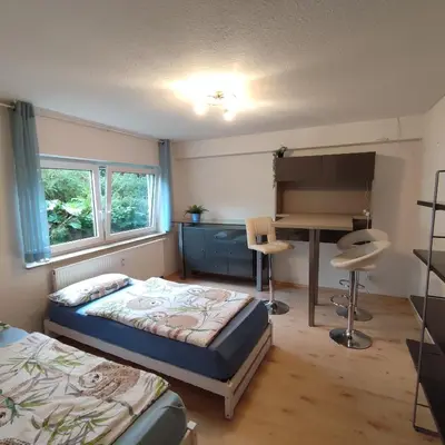 Ein Bett oder Betten in einem Zimmer der Unterkunft Siebeneichen
