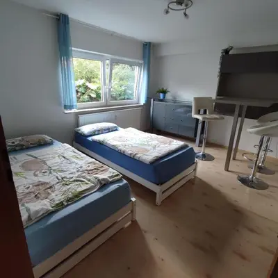 Ein Bett oder Betten in einem Zimmer der Unterkunft Siebeneichen