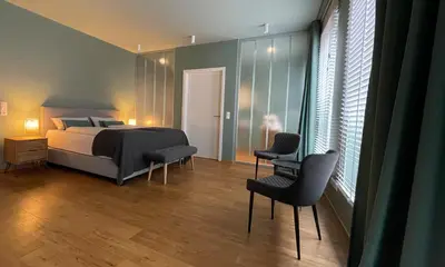 Ein Bett oder Betten in einem Zimmer der Unterkunft Ferienwohnung Hensel & Gretel