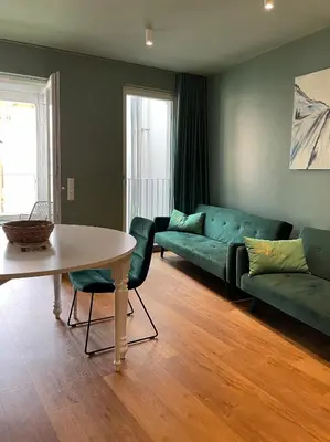 Ein Sitzbereich in der Unterkunft Ferienwohnung Hensel & Gretel