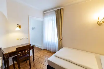 Ein Bett oder Betten in einem Zimmer der Unterkunft Schloss Neckarbischofsheim