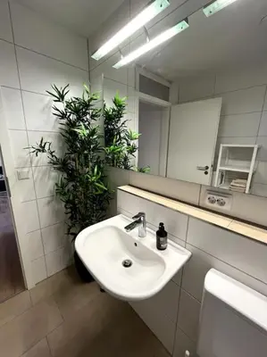 Ein Badezimmer in der Unterkunft City Appartement direkt am Schloss!